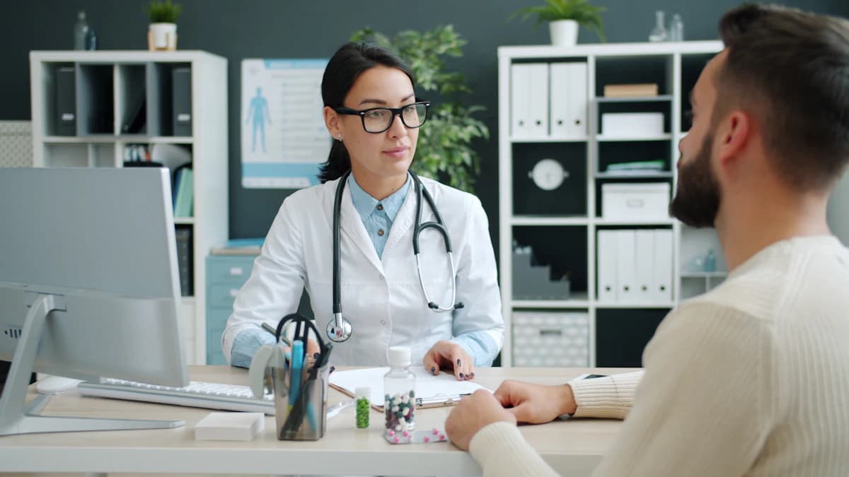 Physician consulting with a patient