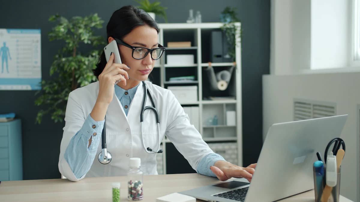 Clinician on the phone with a payer while reviewing a request