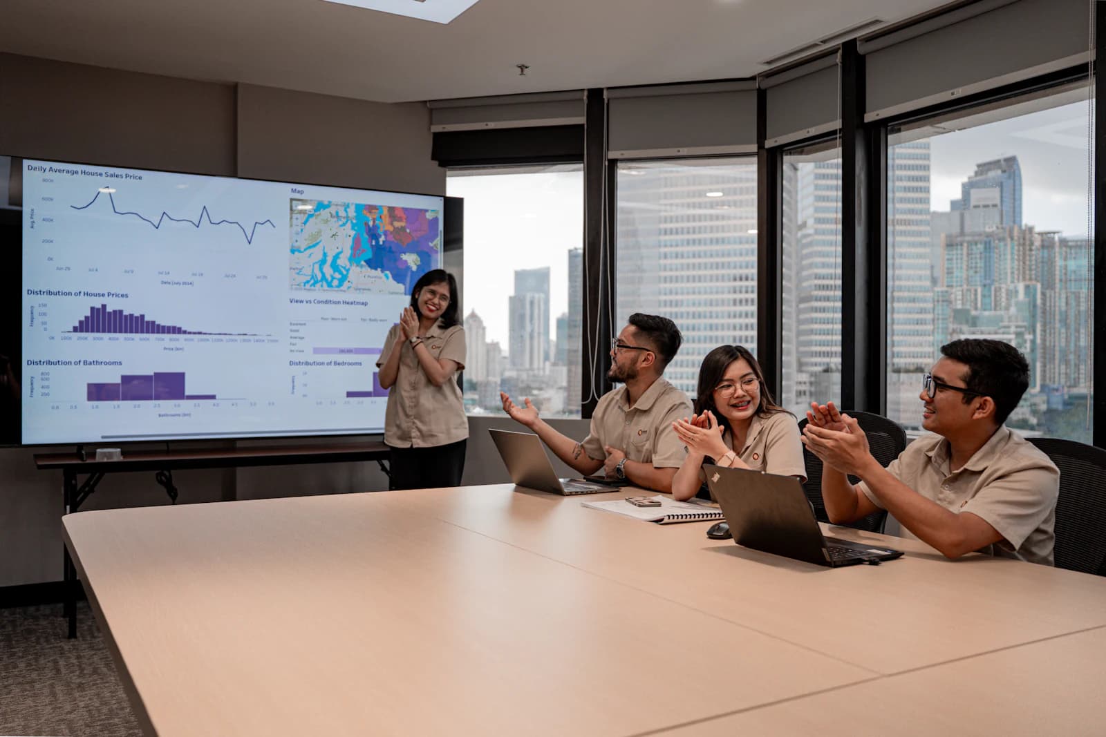 Revenue cycle team reviewing performance data in a meeting room